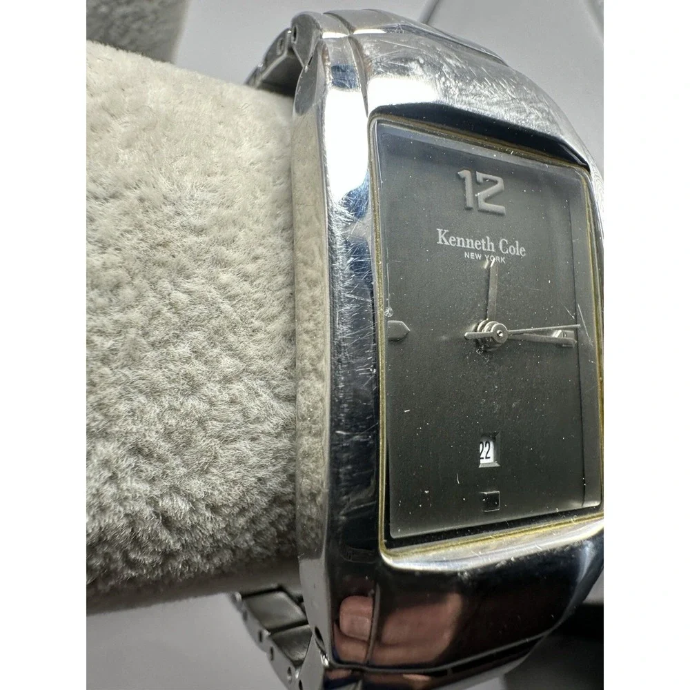 Kenneth Cole it showing